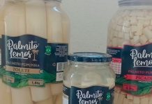 Risco à saúde: Anvisa proíbe venda e determina apreensão de marca de palmito Close em prateleira de supermercado com foco em potes de palmito em conserva e selo de fiscalização da Anvisa sobreposto