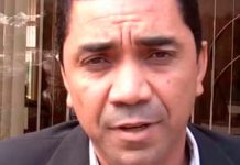 Justiça condena ex-prefeito de João Pinheiro por desvio de R$ 1 milhão em verbas públicas. Fachada do Fórum de João Pinheiro ou martelo de juiz sobre mesa de madeira, simbolizando a condenação do ex-prefeito.