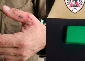 Mãe é presa em João Pinheiro após morder policial para tentar impedir apreensão de filho Viatura da Polícia Militar estacionada em rua de João Pinheiro durante ocorrência.