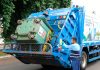 Lixo em Uberlândia: Novo decreto exige separação obrigatória e plano de gerenciamento Caminhão de coleta de lixo urbano realizando o serviço em rua de Uberlândia