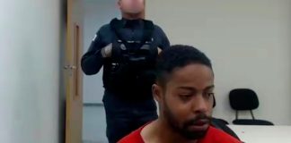 Corpo de suspeito de matar o próprio filho em Uberlândia segue no IML Fachada do Instituto Médico Legal ou viatura da Polícia Civil de Minas Gerais estacionada, representando o andamento do caso em Uberlândia.